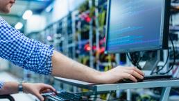 IT server room with technician