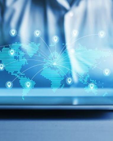 world map lights emerging from a tablet